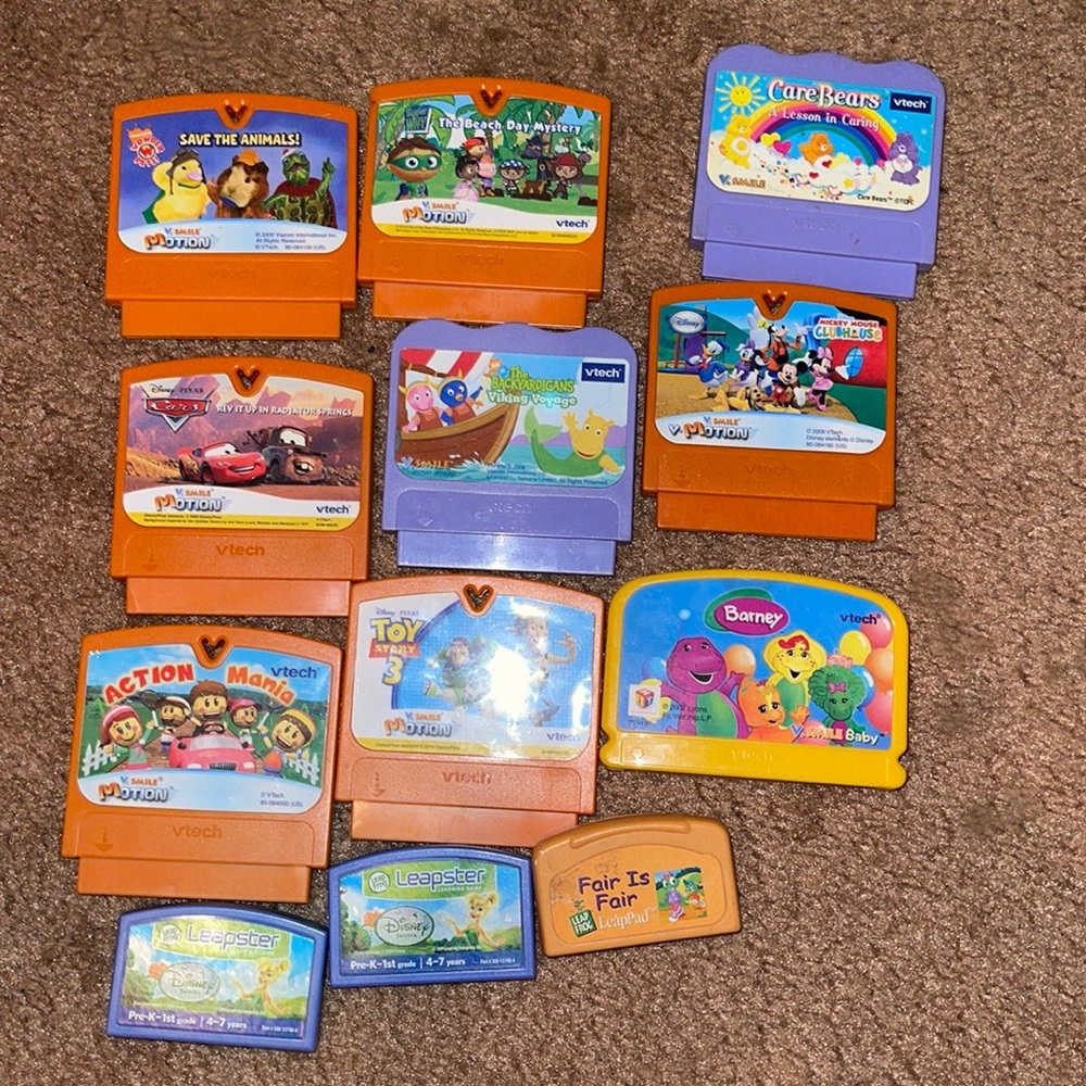 Vtech Leapster games Care Bears Cars and more